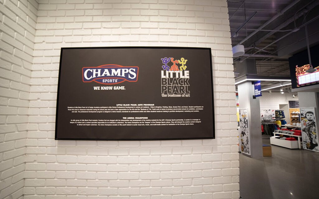 Champs Little Black Pearl sign