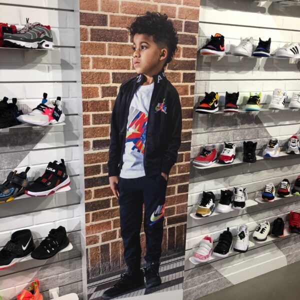 Kid graphic in champs store