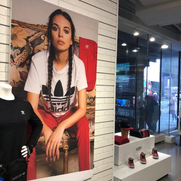 Women sitting graphic in champs store